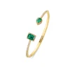 OPEN DIAMOND EMERALD BANGLE